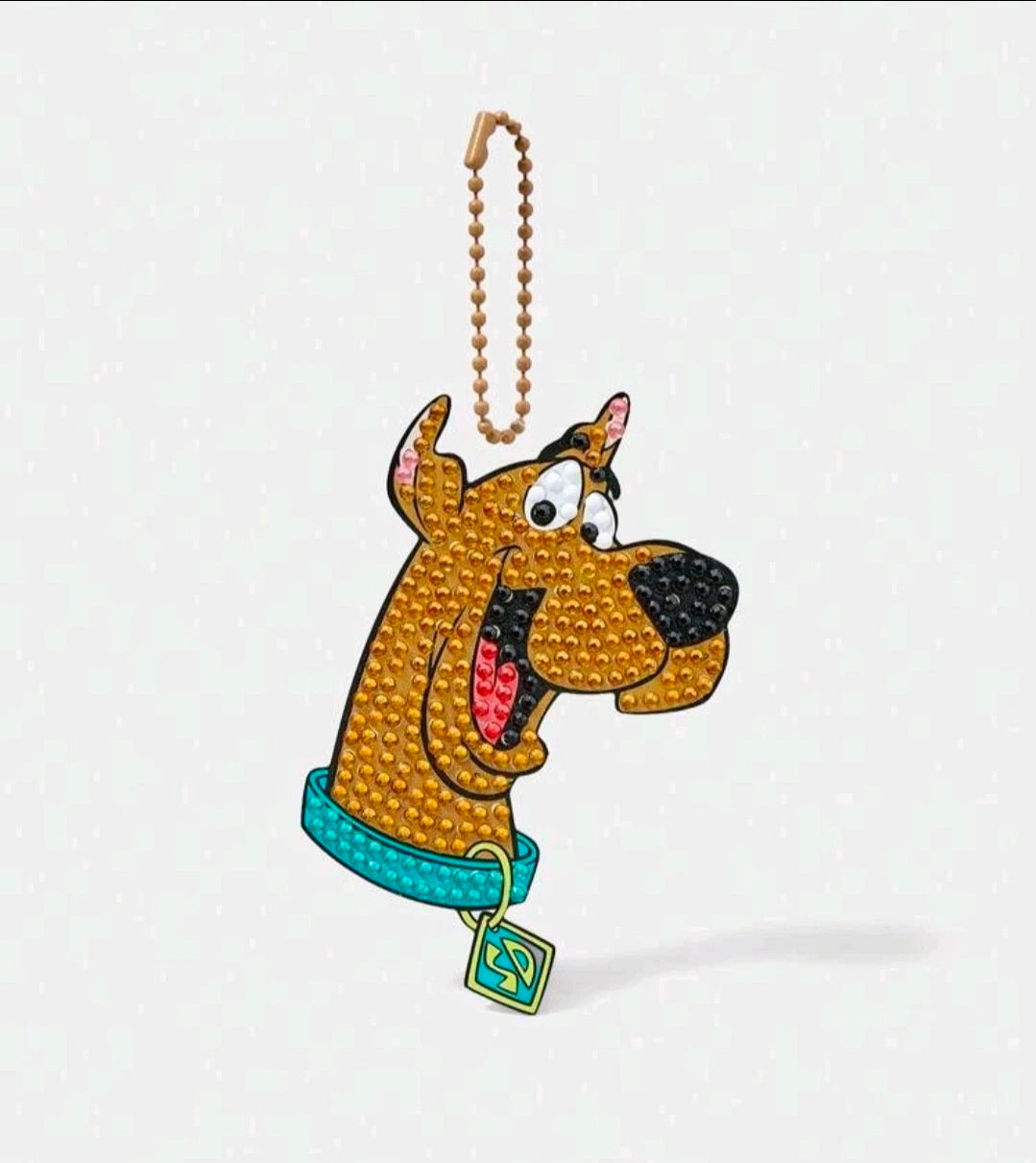 Diamond painting dog ornament charm with brown hanging cord, teal collar, black nose