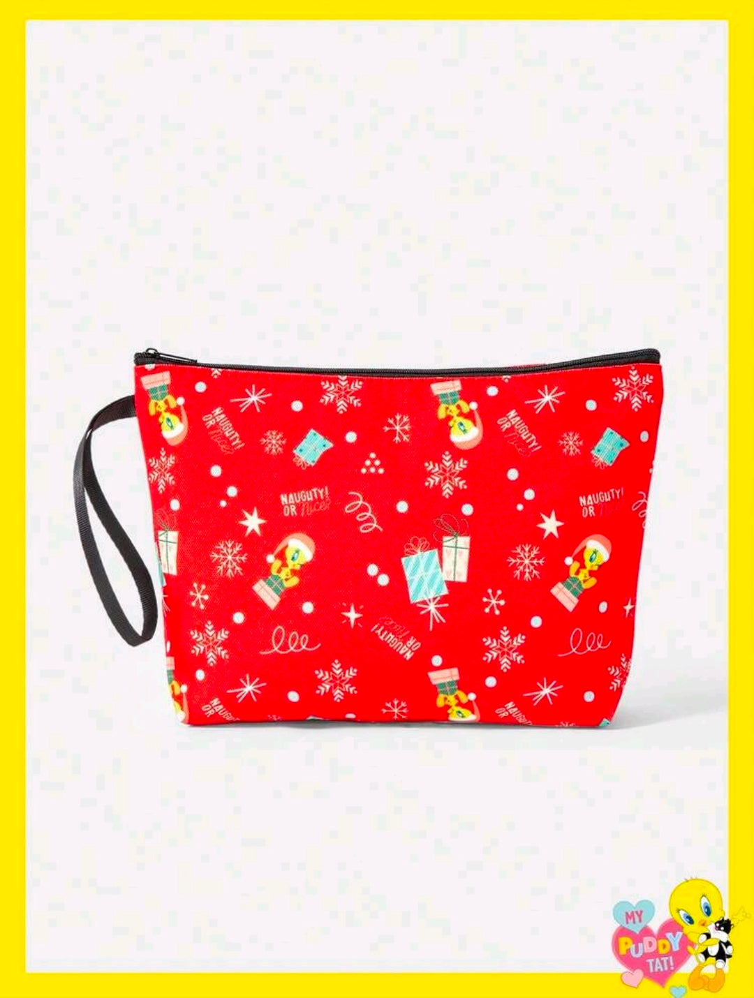 Red holiday makeup bag with zipper top, black strap, and festive Christmas character pattern