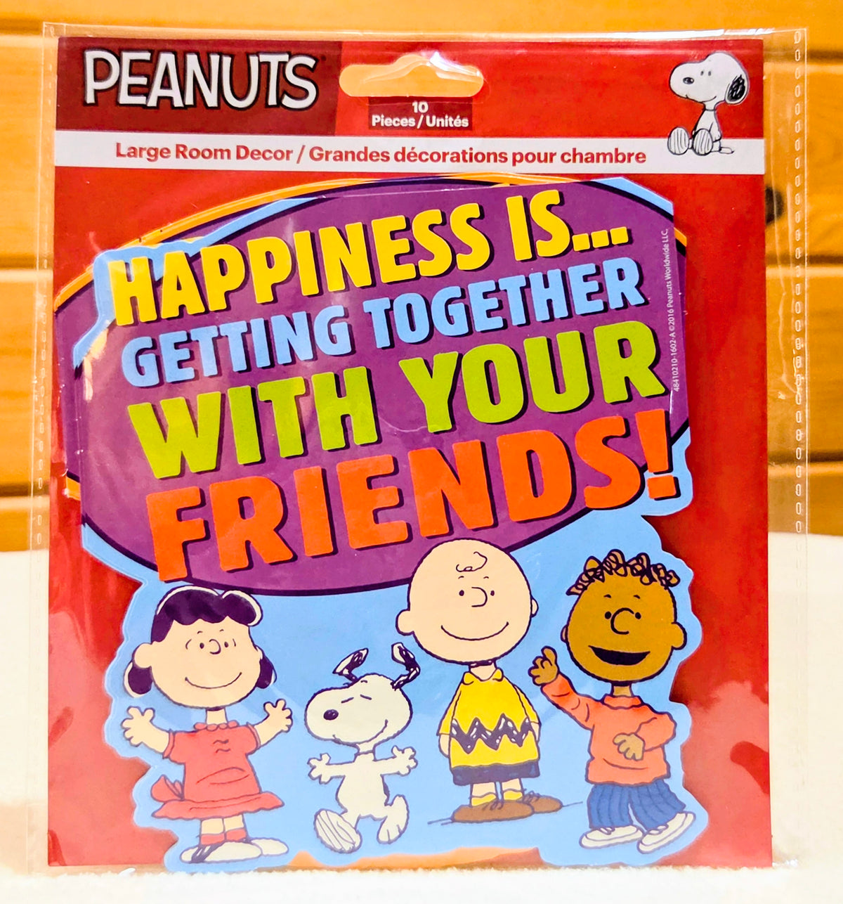 Peanuts wall decor pack, colorful card with 'HAPPINESS IS...' quote and Snoopy
