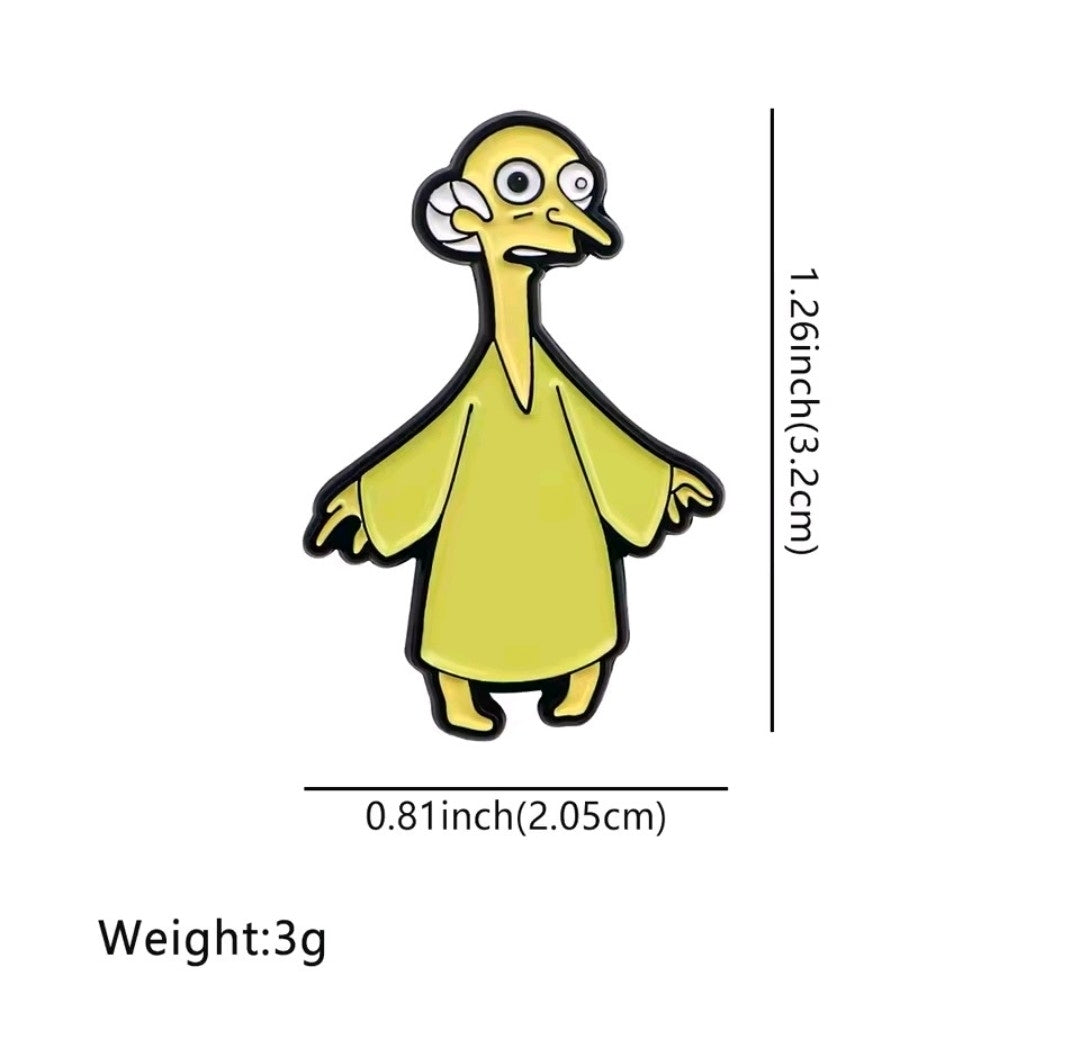 Yellow bird-like character enamel pin with white goggles and small arms
