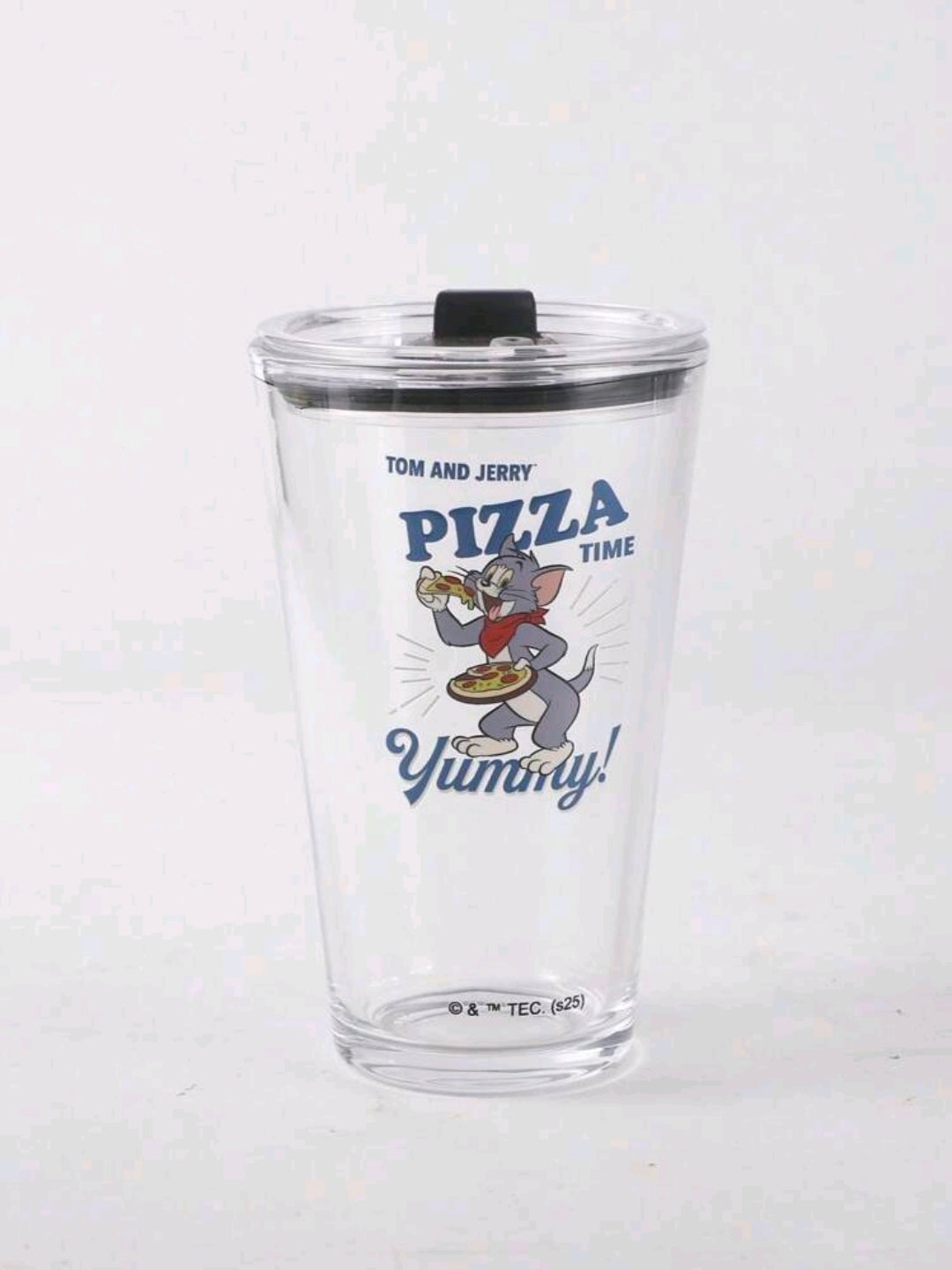 Clear glass tumbler with black lid and Pizza Time character graphic