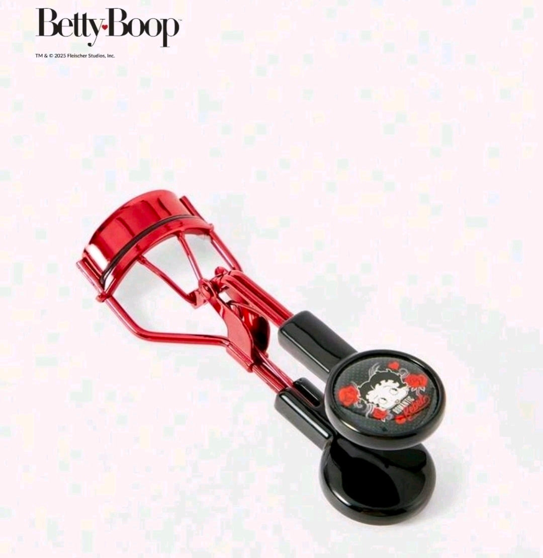 Betty Boop eyelash curler, red curler bar with black ergonomic handle and logo badge