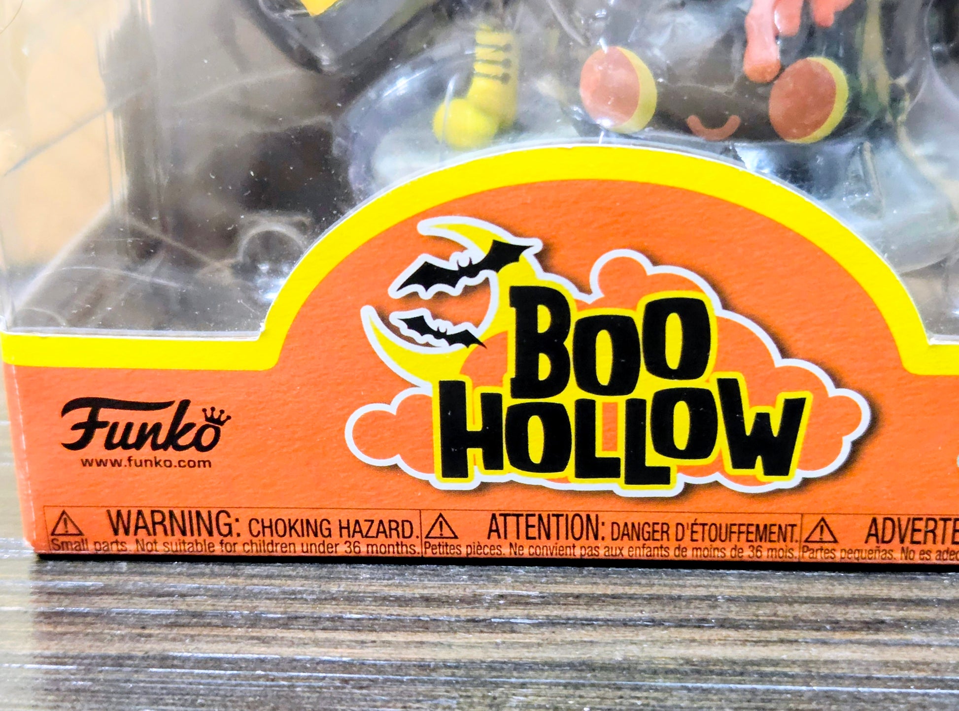 Funko Boo Hollow blister pack close-up, Boo Hollow logo with choking warning band