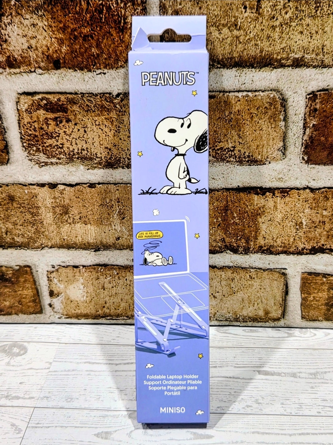 Purple PEANUTS Snoopy foldable laptop stand holder box on display