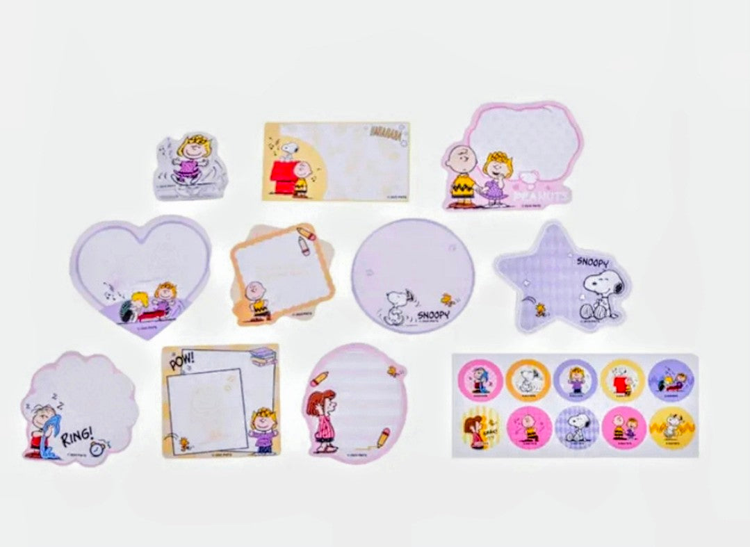 Assorted Peanuts sticker cutouts and mini memo notes flat lay