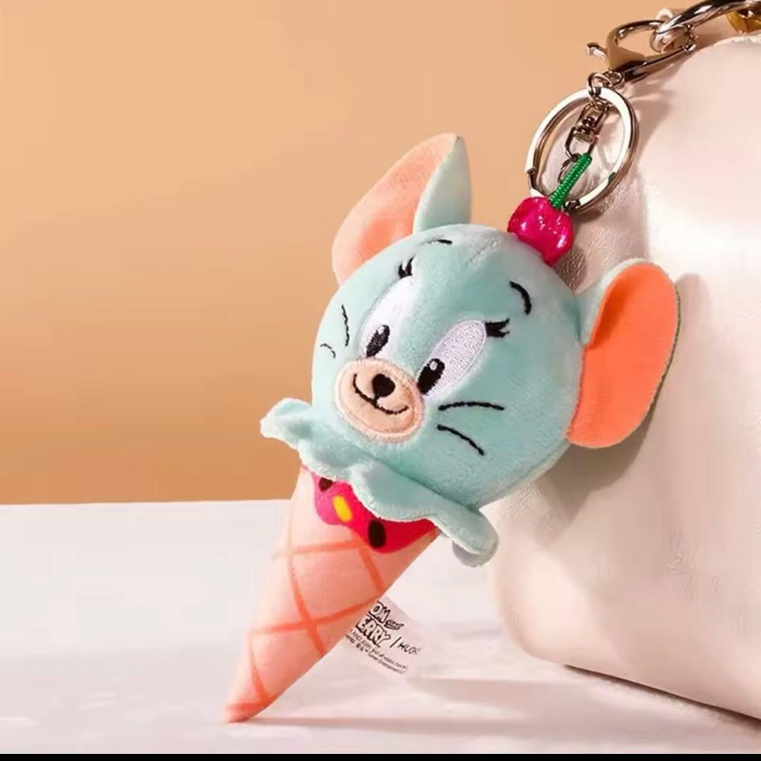 Light-blue plush ice cream cone keychain with pink cherry and keyring