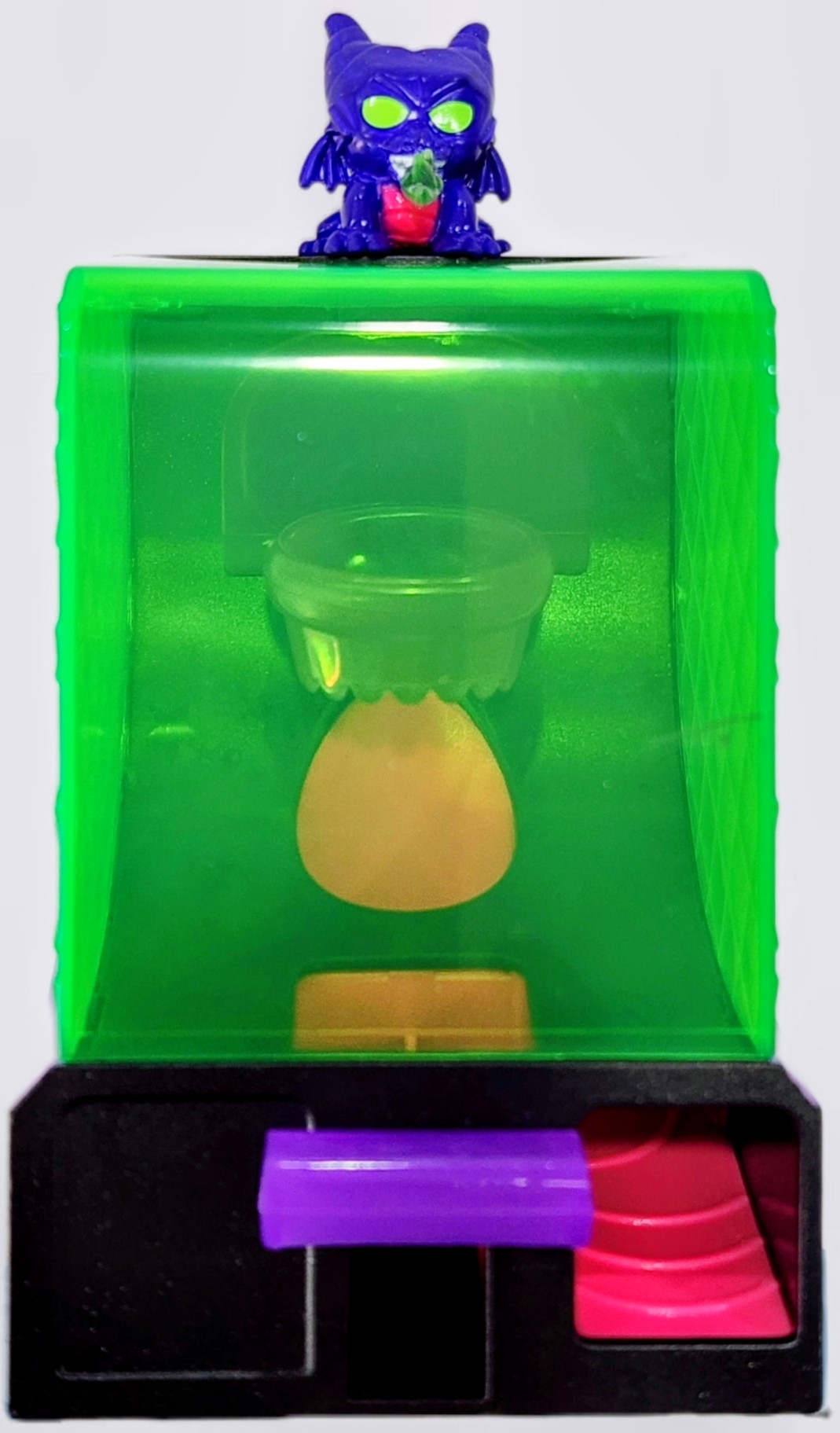 Arcade Hoopz toy with green hoop stand and purple dragon figure on top