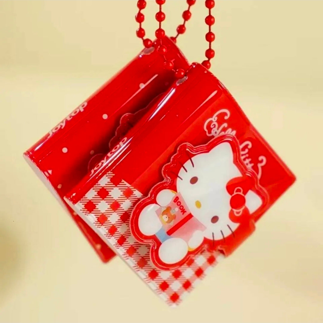 Hello Kitty mini note cards with plaid bases and glossy red beaded keychains