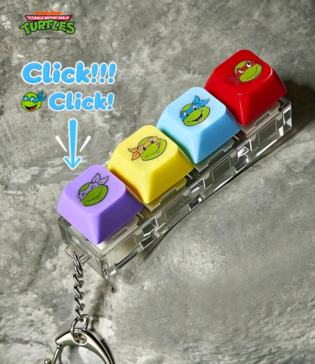 TMNT keyboard clicker keychain with chain, four keycaps, and turtle face designs