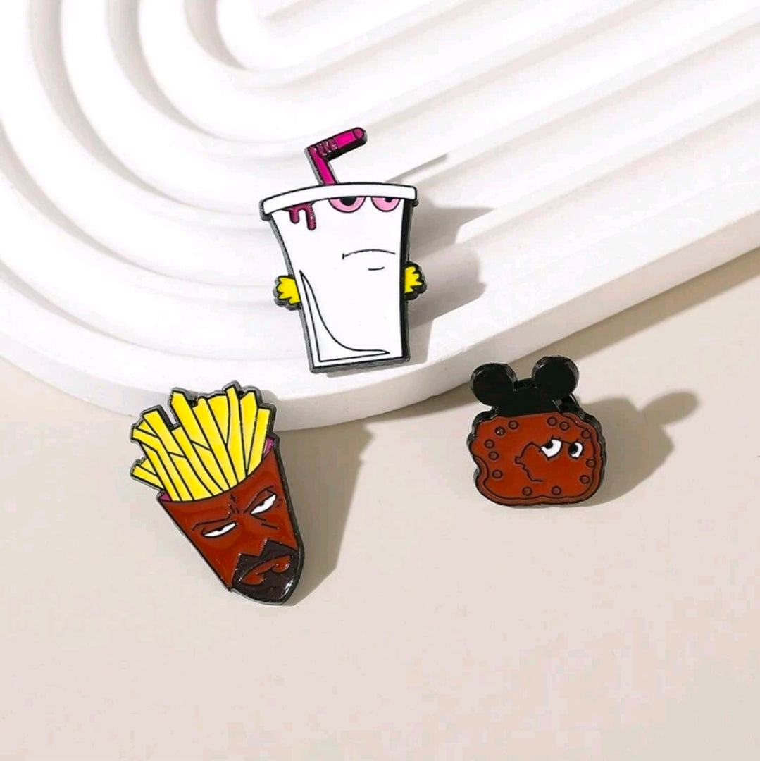 Enamel pin set of three character pins: shake cup, fries face, red cookie with ears
