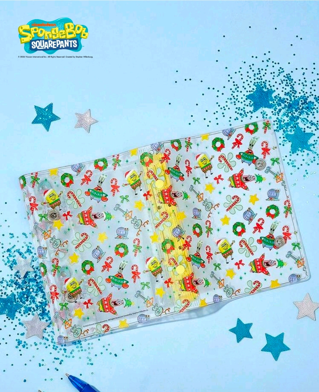 6-ring SpongeBob SquarePants photo album opened, decorated pages with star pattern