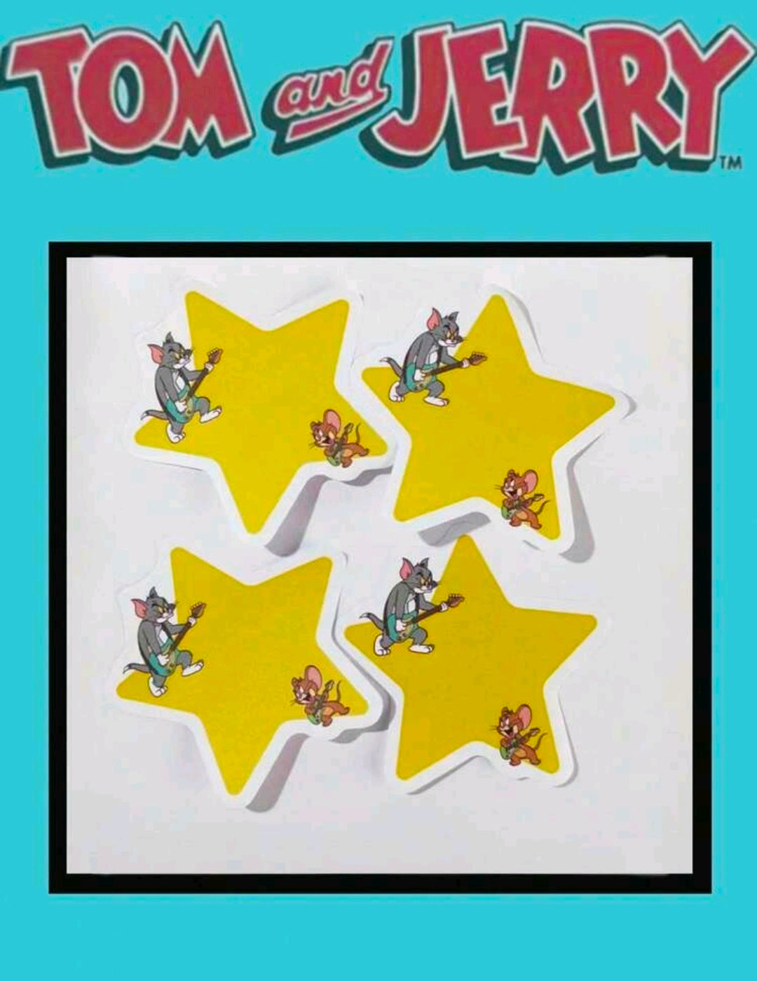 Yellow star-shaped sticky notes with Tom and Jerry character prints, stacked in a frame