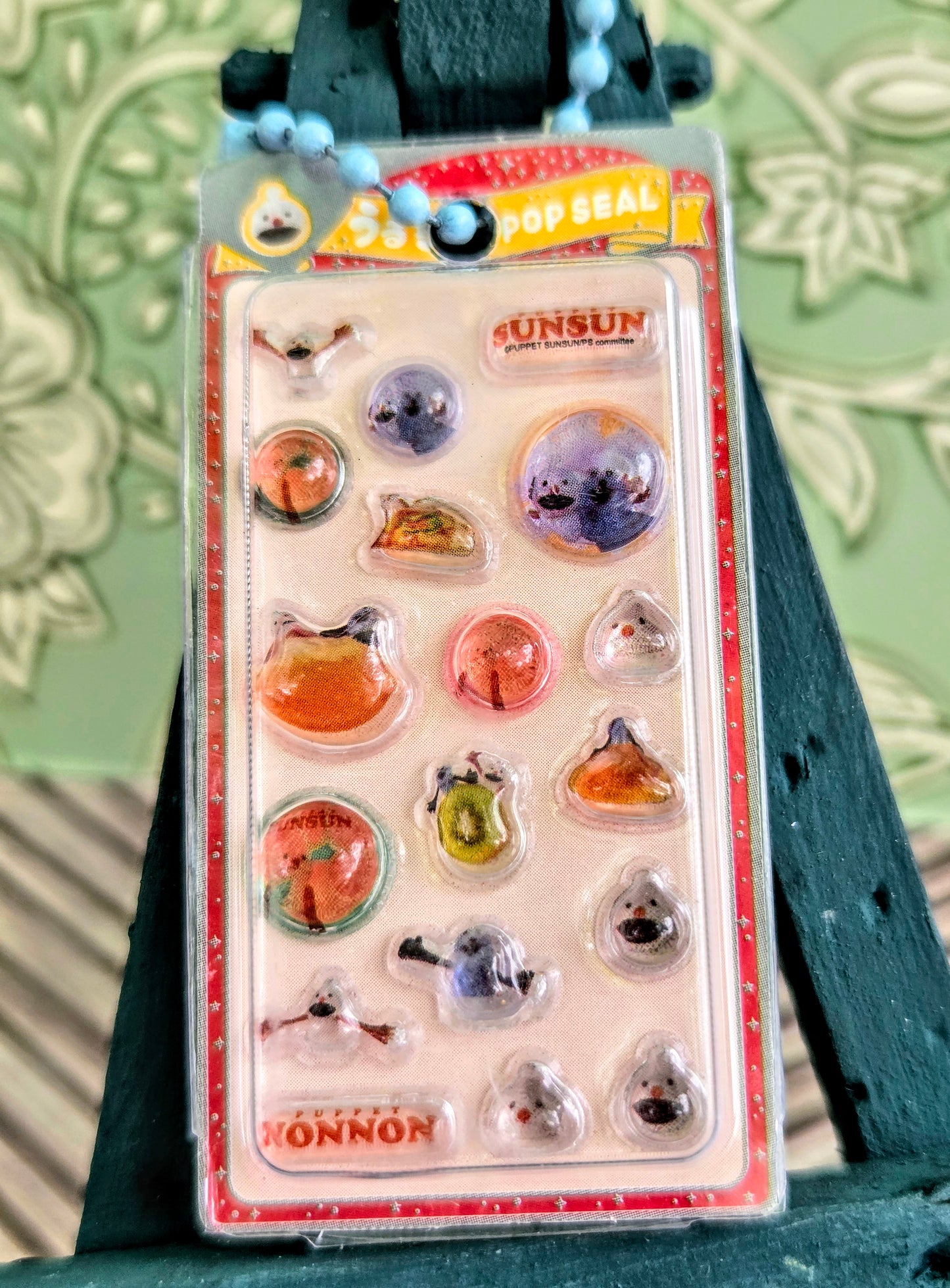 Clear blister sticker keychain pack with multiple animal icons and pop seal header