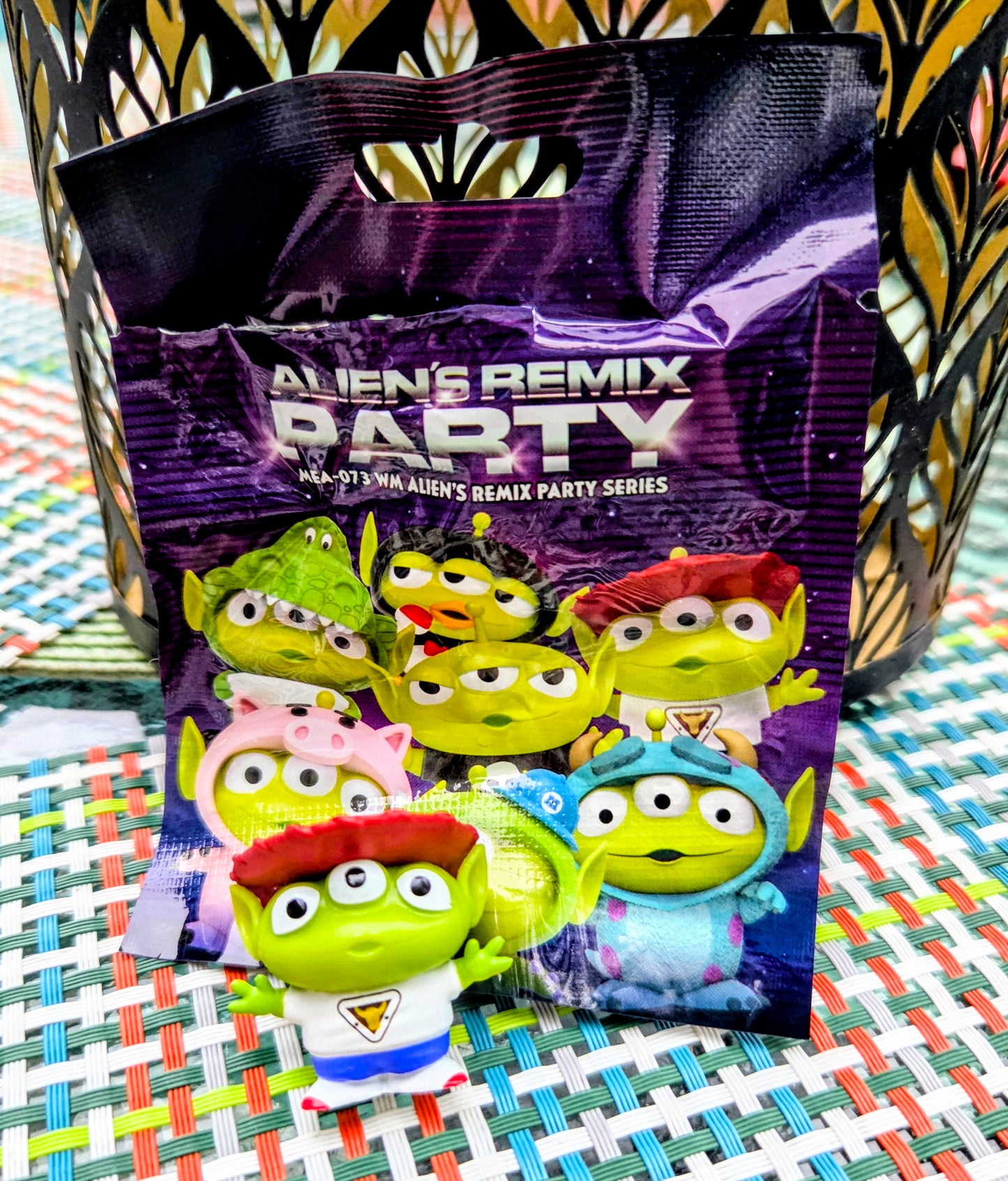 Alien Remix mini figure packaging bag with several green characters visible inside
