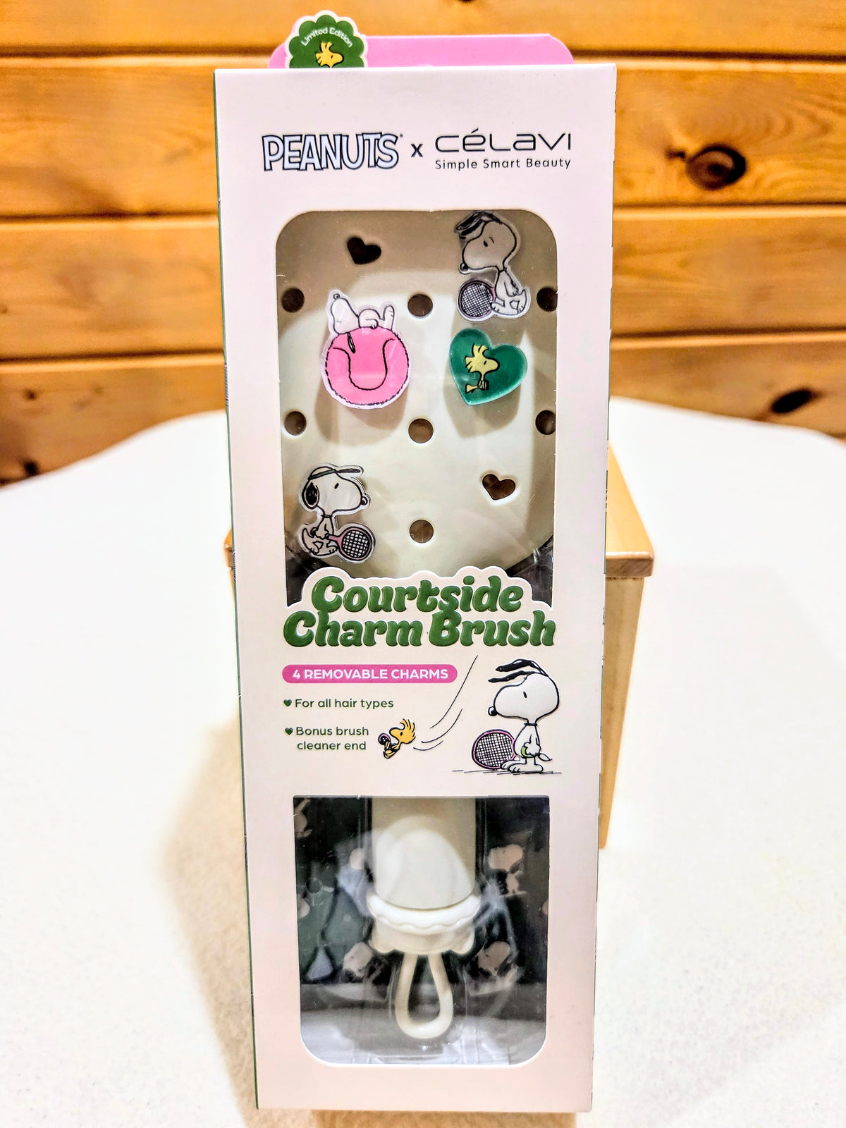Snoopy charm paddle hair brush with four removable charms, boxed