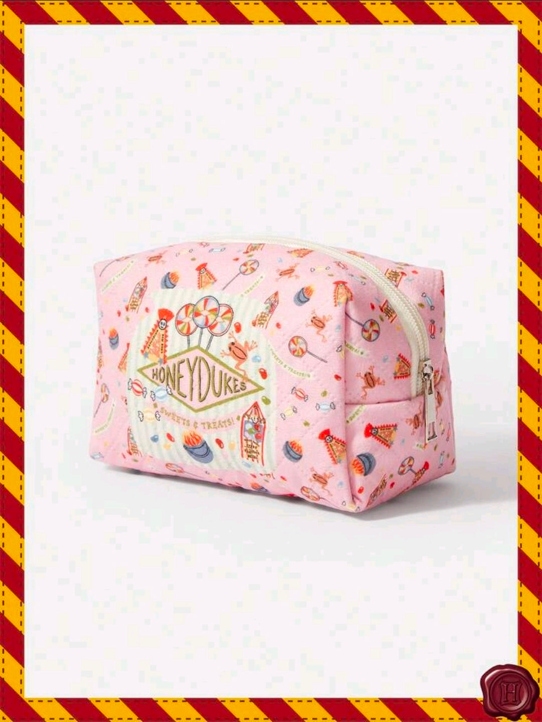 Pink Honeydukes makeup pencil pouch with zipper, front view