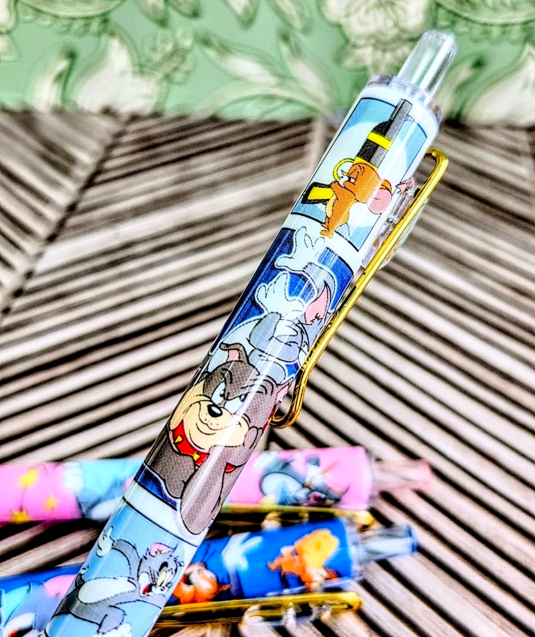 Light blue Tom & Jerry gel pen with cartoon characters and clear tip