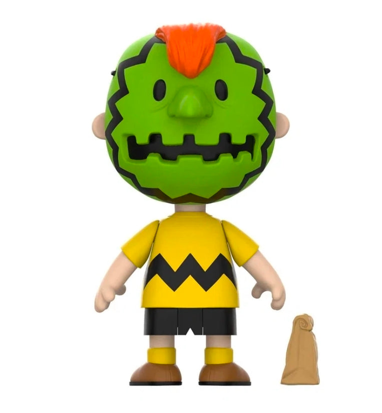 Standing Halloween vinyl figure in green monster costume with orange mohawk and yellow shirt