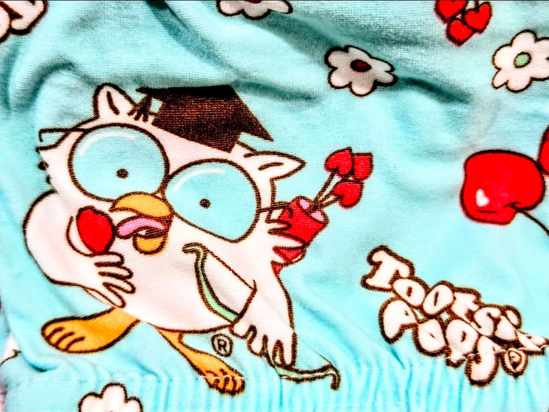 Mint sleep shorts fabric with cartoon animal character and Tootsie-style text print