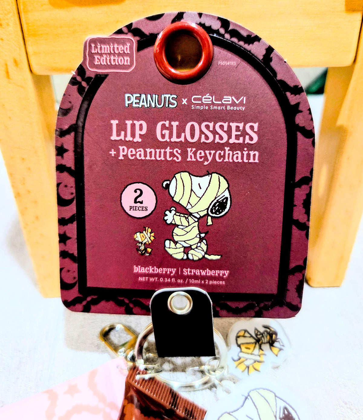 Limited edition Halloween lip gloss package with keychain clip and charms