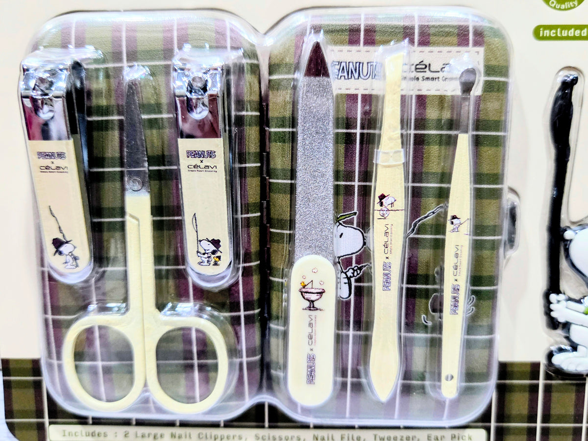 Blister tray open with 8 manicure tools, nail file, and green plaid design