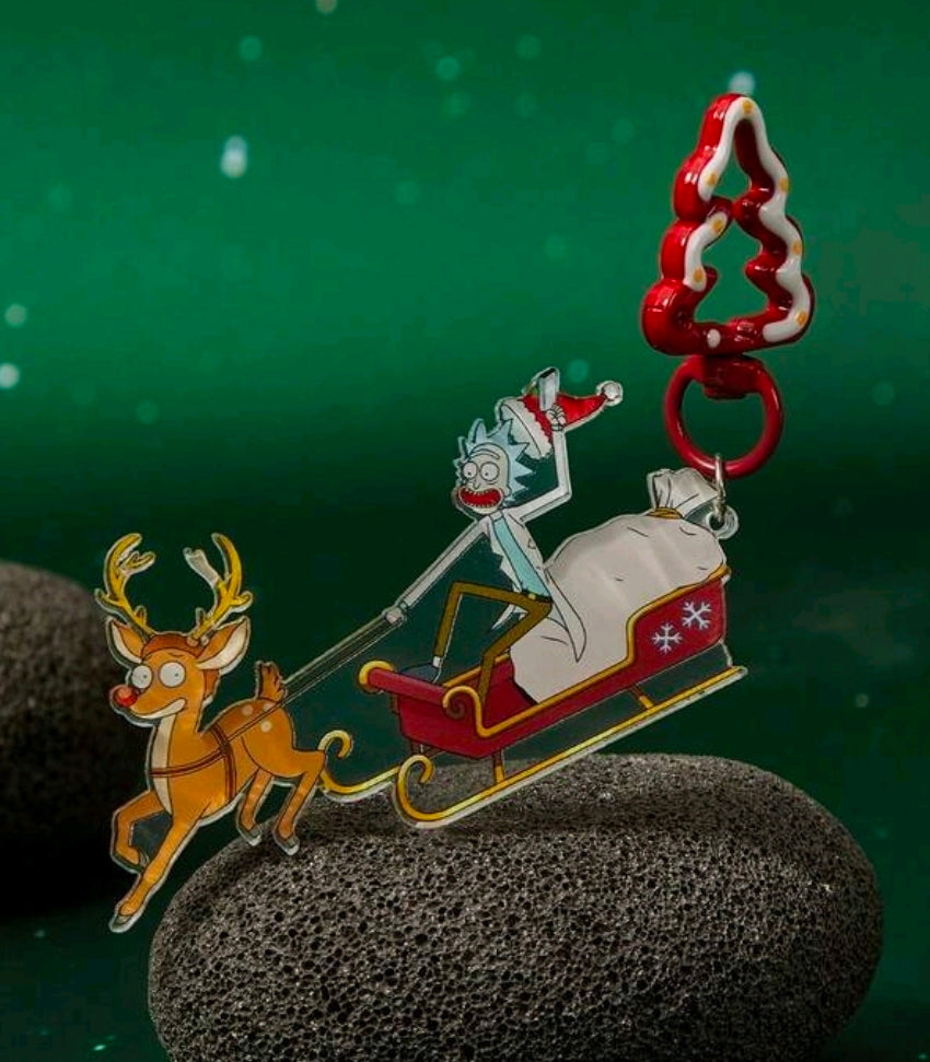 Christmas carabiner keyring with reindeer, sleigh, and tree top charm