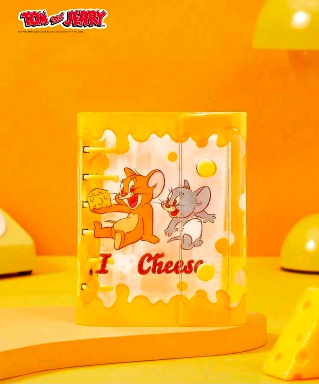 Yellow A7 sticker binder planner cover with Tom & Jerry and cheese text, front view