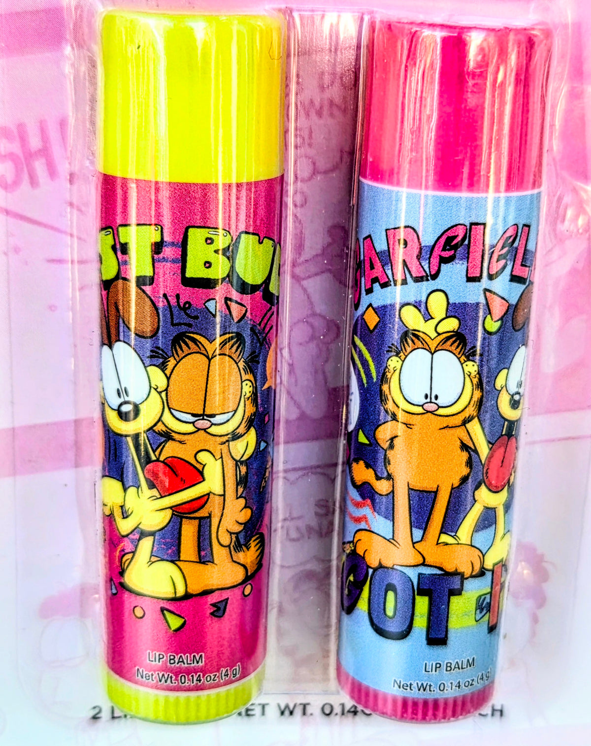 Garfield lip balm tubes set with bright yellow caps and colorful character graphics