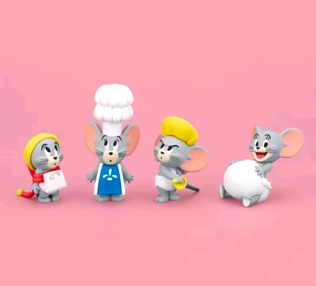 Set of four Tom & Jerry mini figurines in chef outfits, arranged together