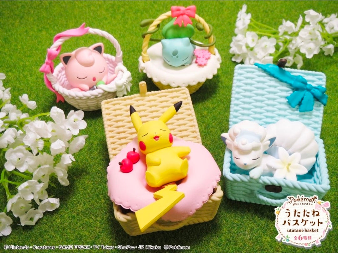 Miniature sleeping character baskets set with pink, green, yellow, and blue woven designs