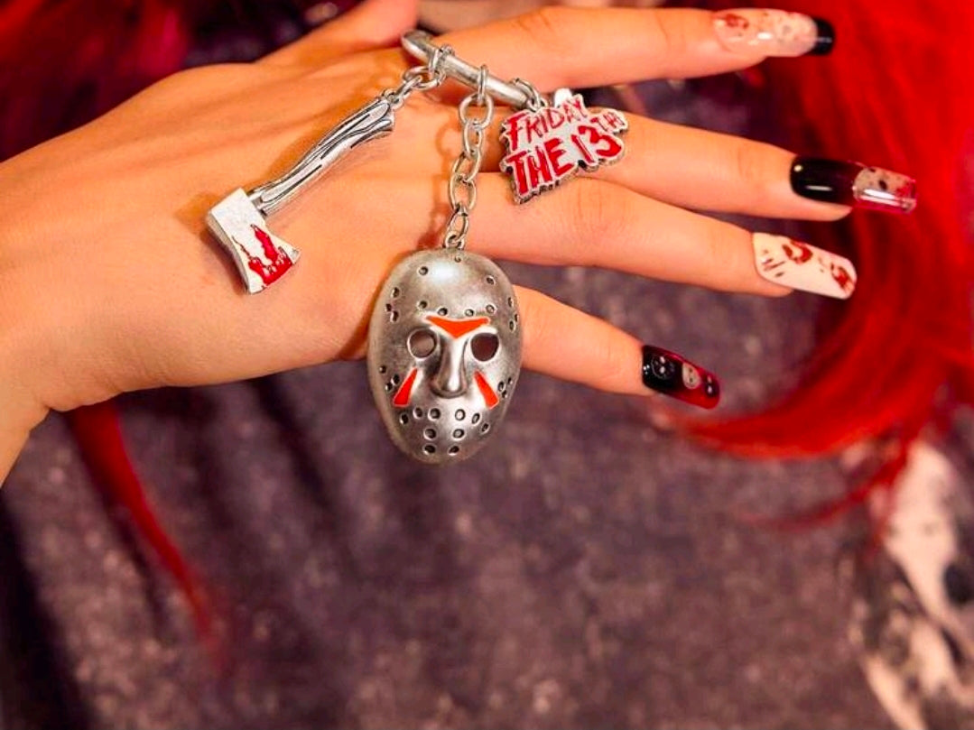 Silver hockey mask keychain pendant with chain and red logo sticker charm