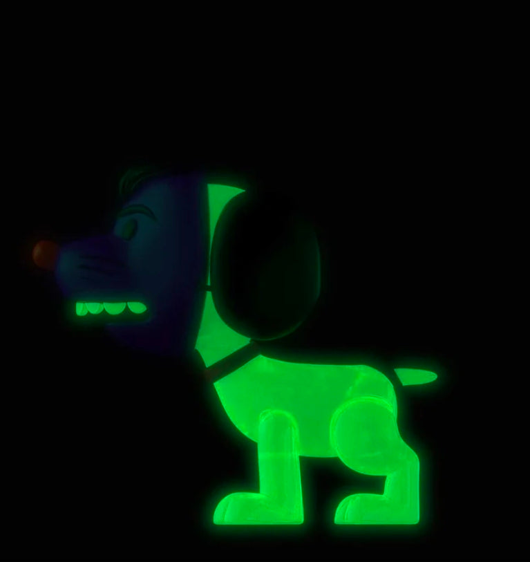 Glowing green dog action figure with purple mask, black ears, and upright stance