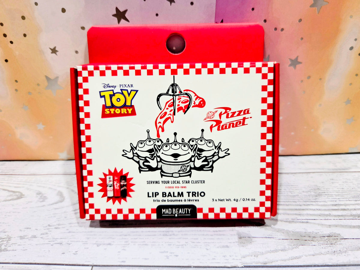 Mad Beauty Toy Story Pizza Planet lip balm trio box with red check border