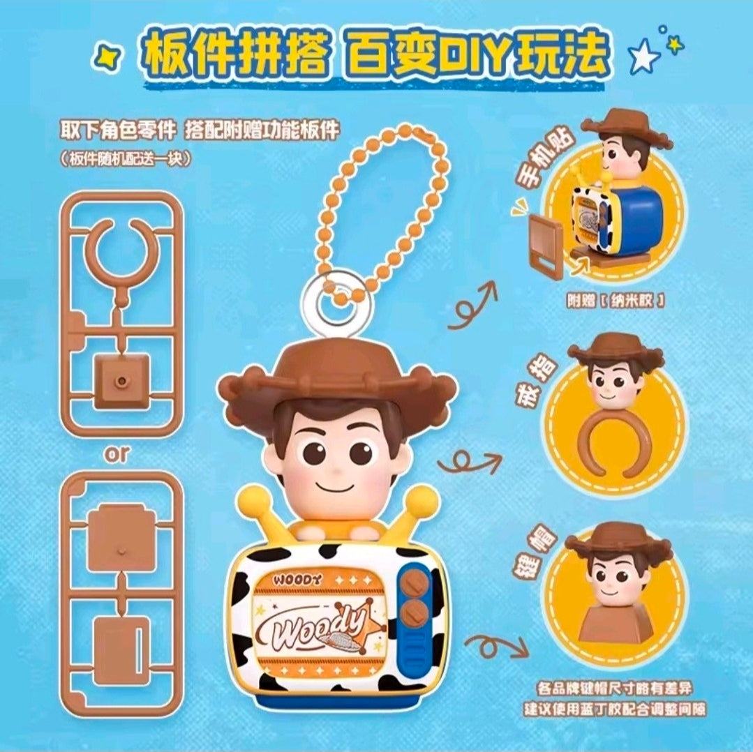 Woody TV figure with interchangeable parts for use as a keychain or phone mount