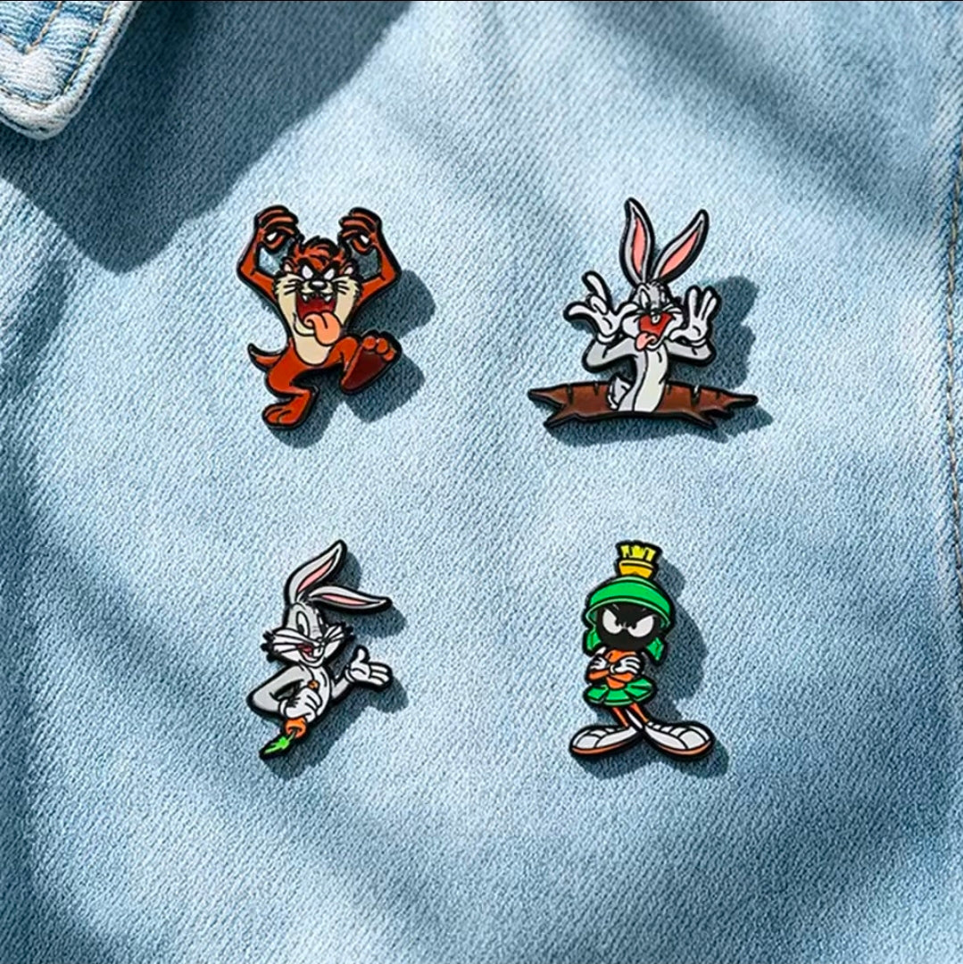 Looney Tunes enamel pin set (4 pcs) on light-wash denim jacket