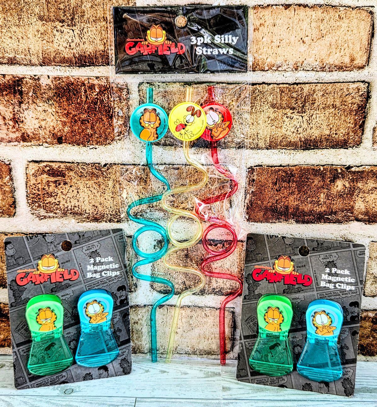Garfield mealtime accessories display with 3-pack straws and magnetic bag clips