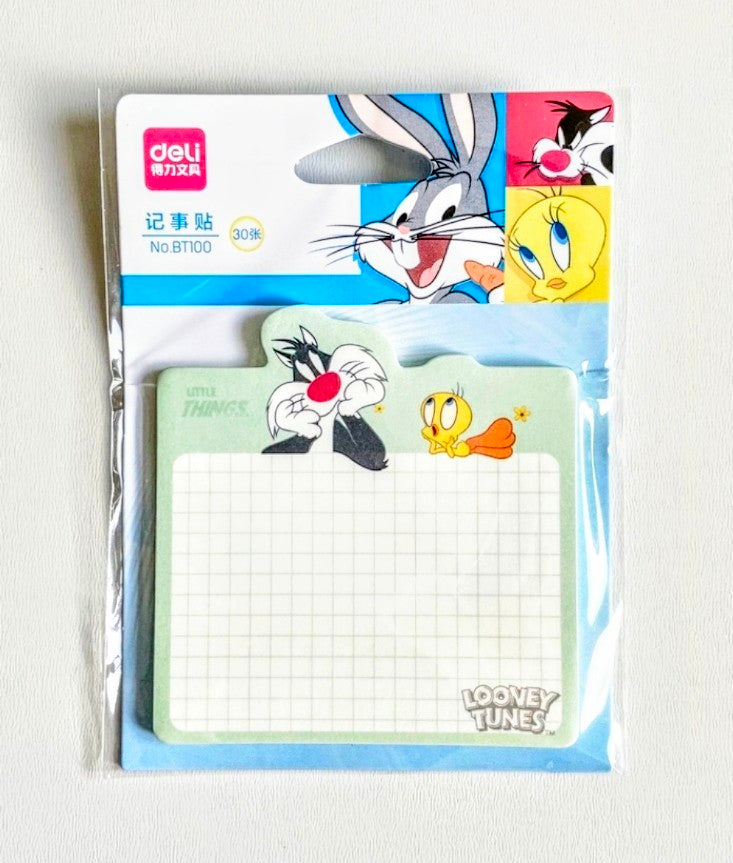 Sticky note pad with Sylvester and Tweety cartoon characters, blank grid notes