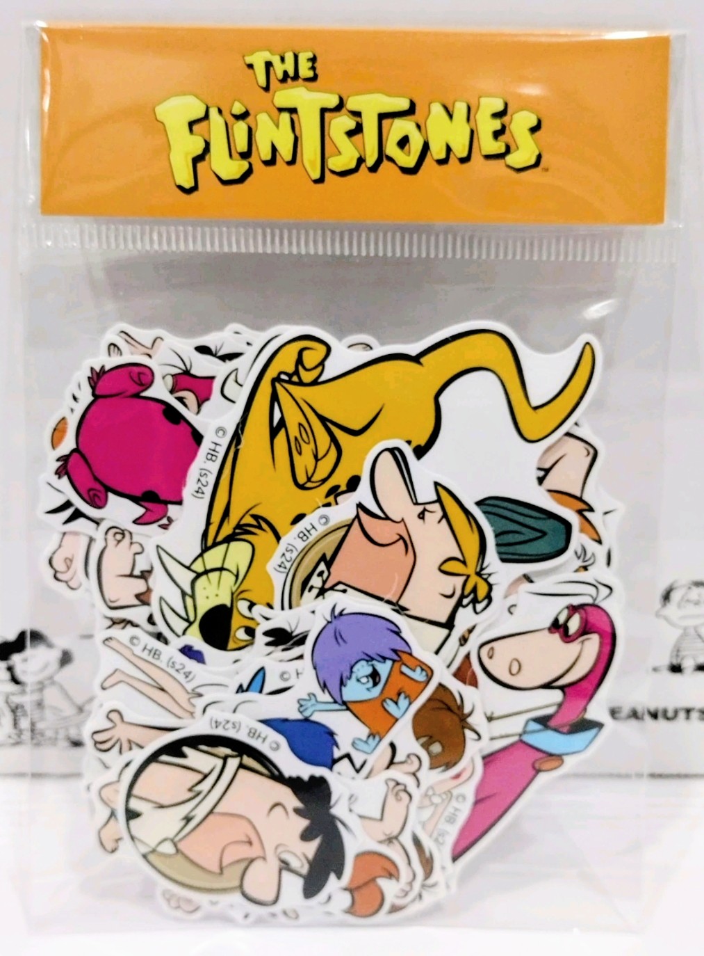 Clear sticker pack with The Flintstones title and colorful character collage