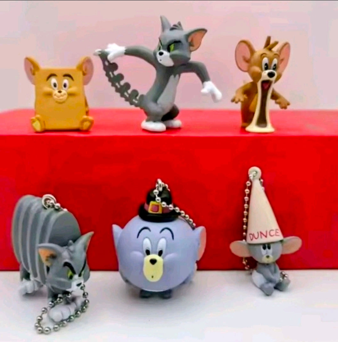 Keychain figure set of six with gray and orange character figures on display