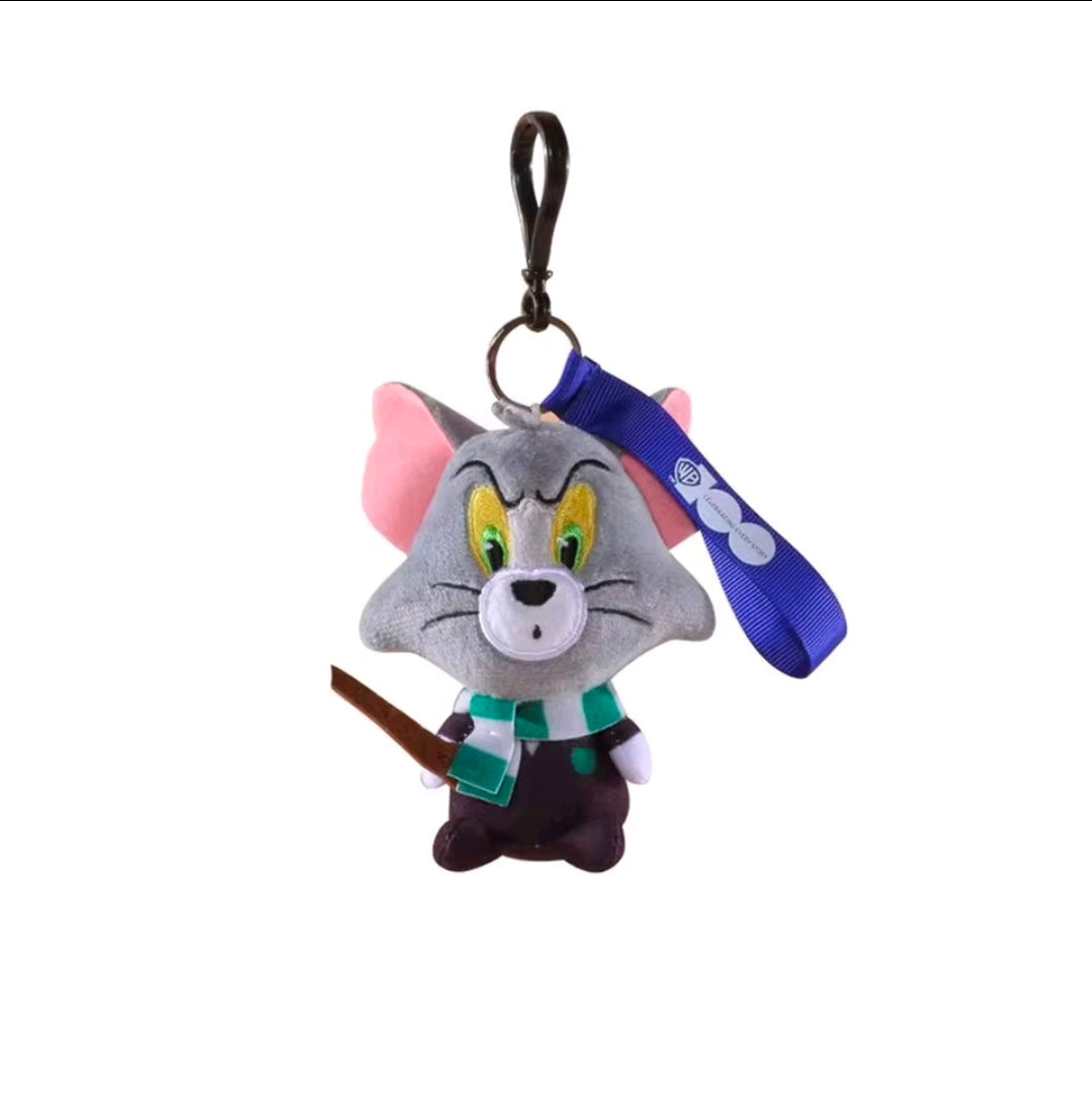 Grey wizard cat plush keychain with blue strap, green eyes, and brown wand