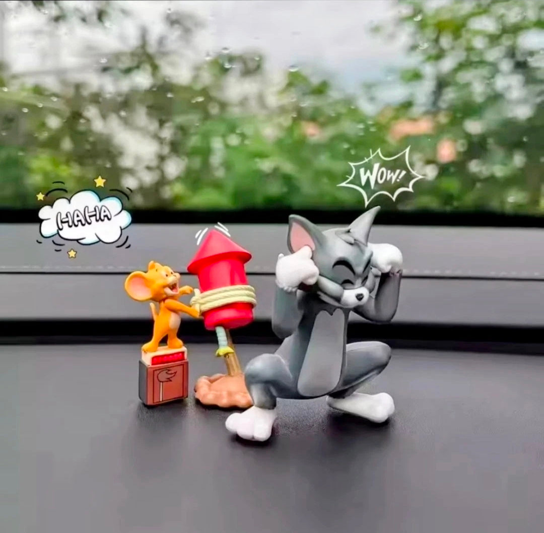 Rocket scene action figure set: orange mouse, gray cat, and red rocket beside base