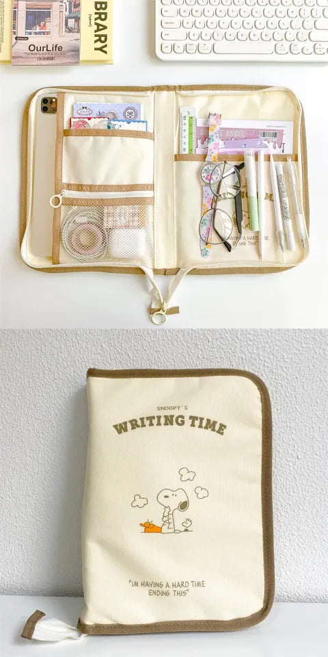 Beige writing time portfolio organizer with Snoopy print, pen pockets, and brown zipper