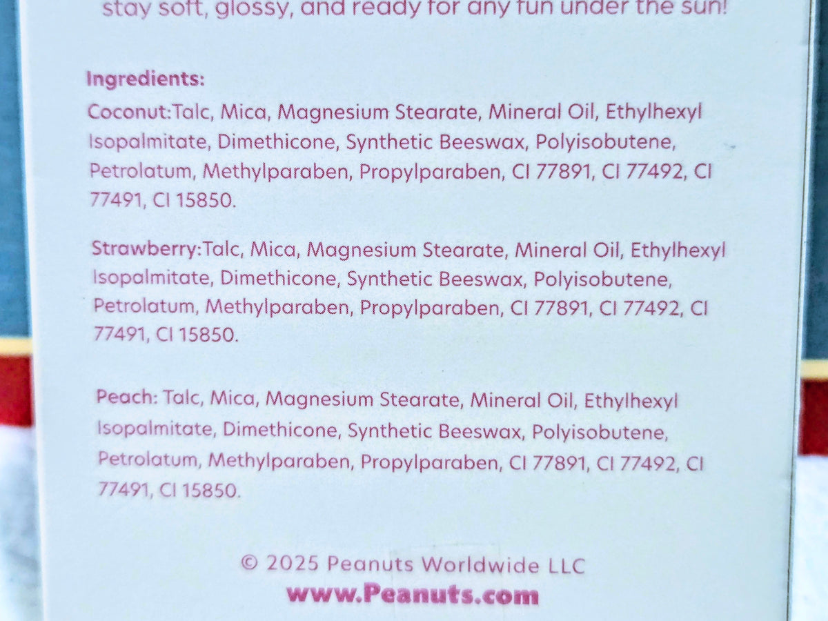 Lip gloss set ingredient list panel with ingredient text for coconut, strawberry, and peach