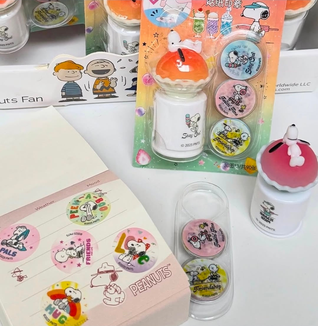 Snoopy sticker stamp roller set with stamp rollers, round stickers, and sticker sheets shown