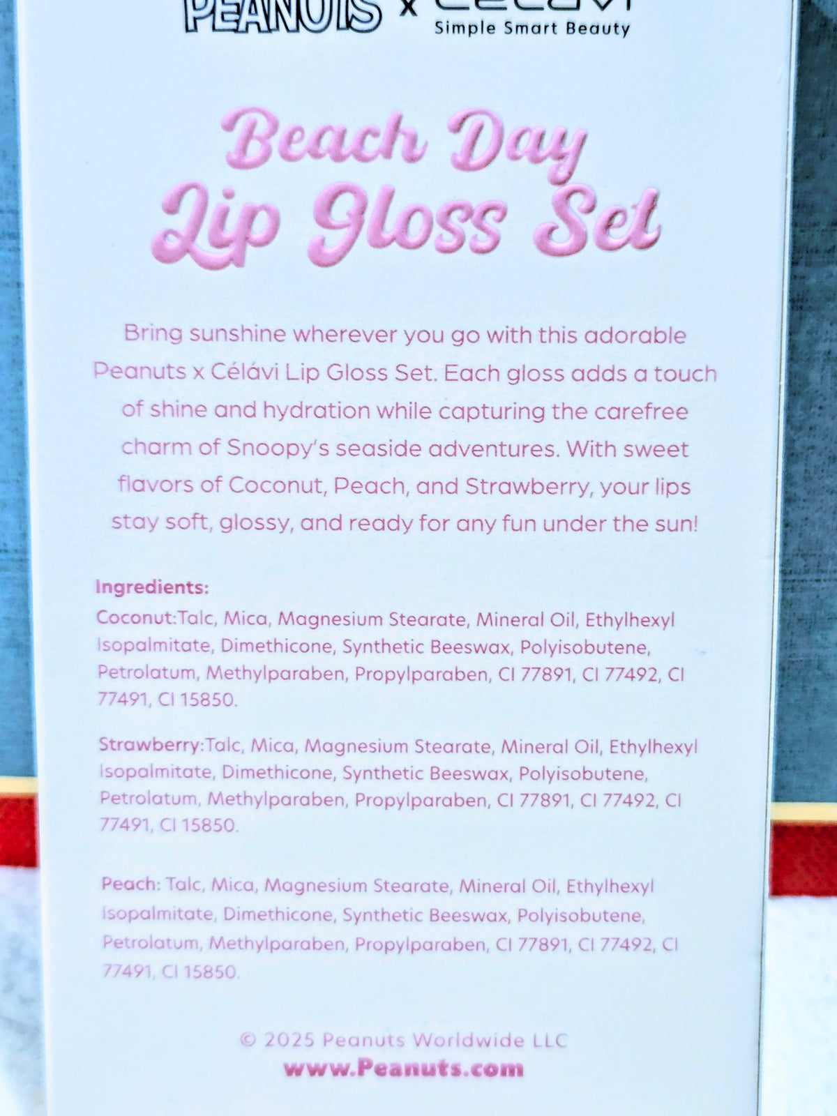 Beach Day lip gloss set box with Snoopy and Celavi branding and product description