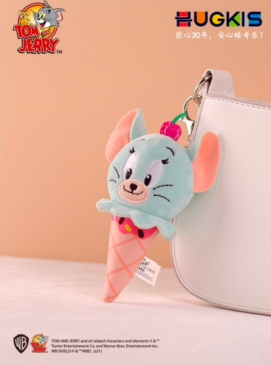 Light-blue plush ice cream cone keychain with cherry topper on a bag clip