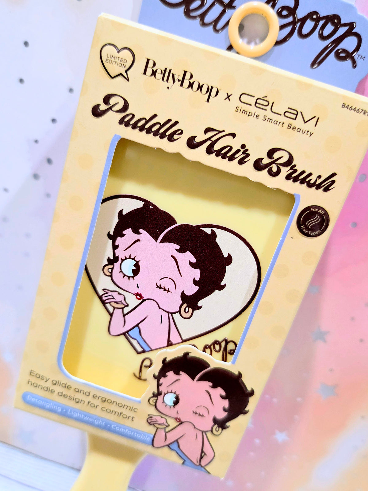 Celavi Betty Boop paddle hair brush blister pack, front view with two character illustrations