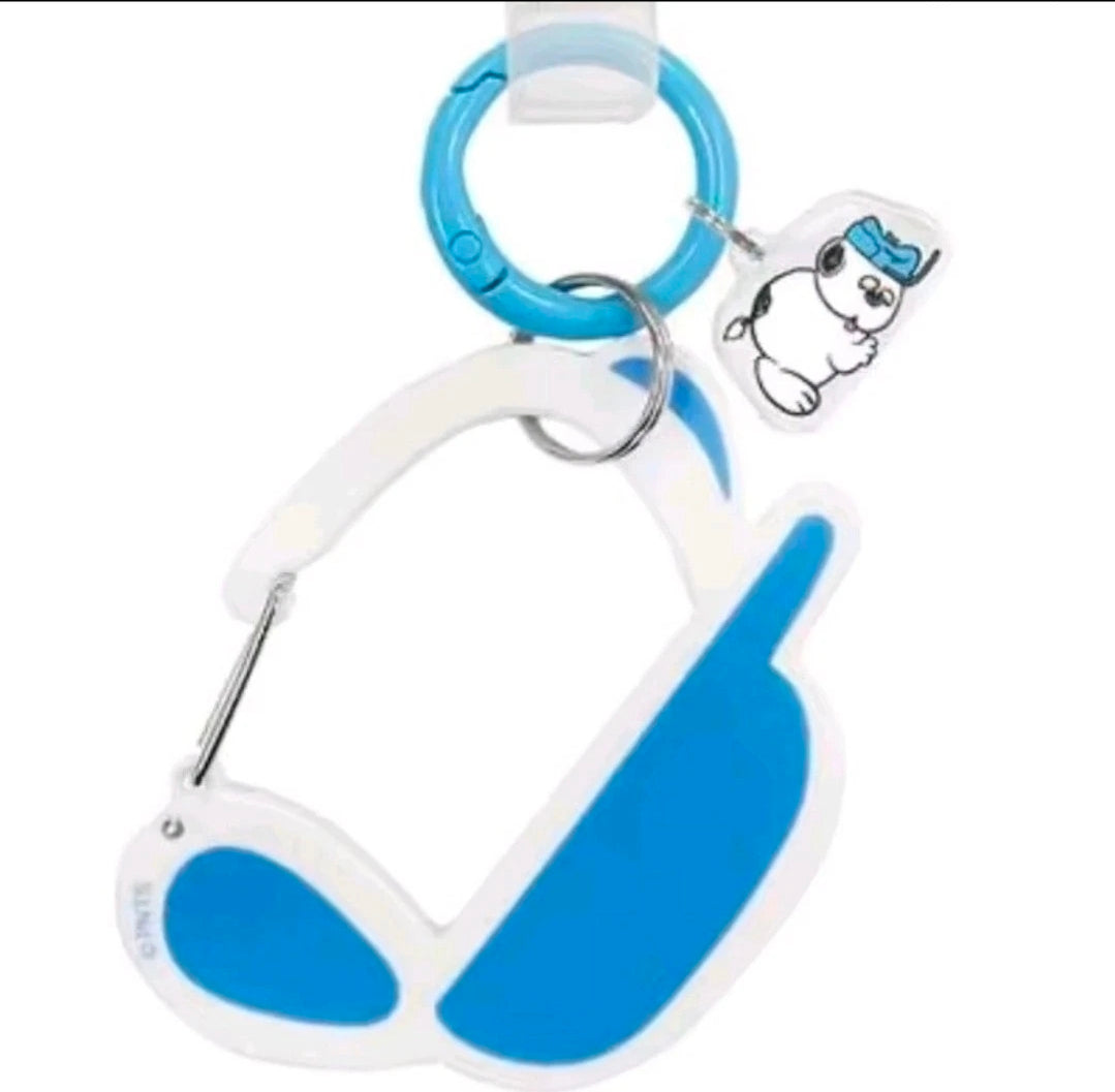White and blue carabiner keychain with blue ring and Snoopy charm