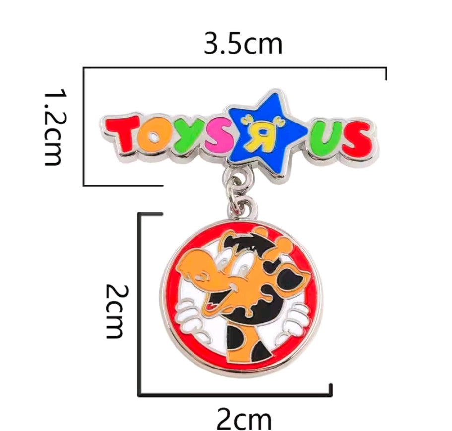 Multicolor enamel dangle charm pin with Toys R Us star and giraffe medallion