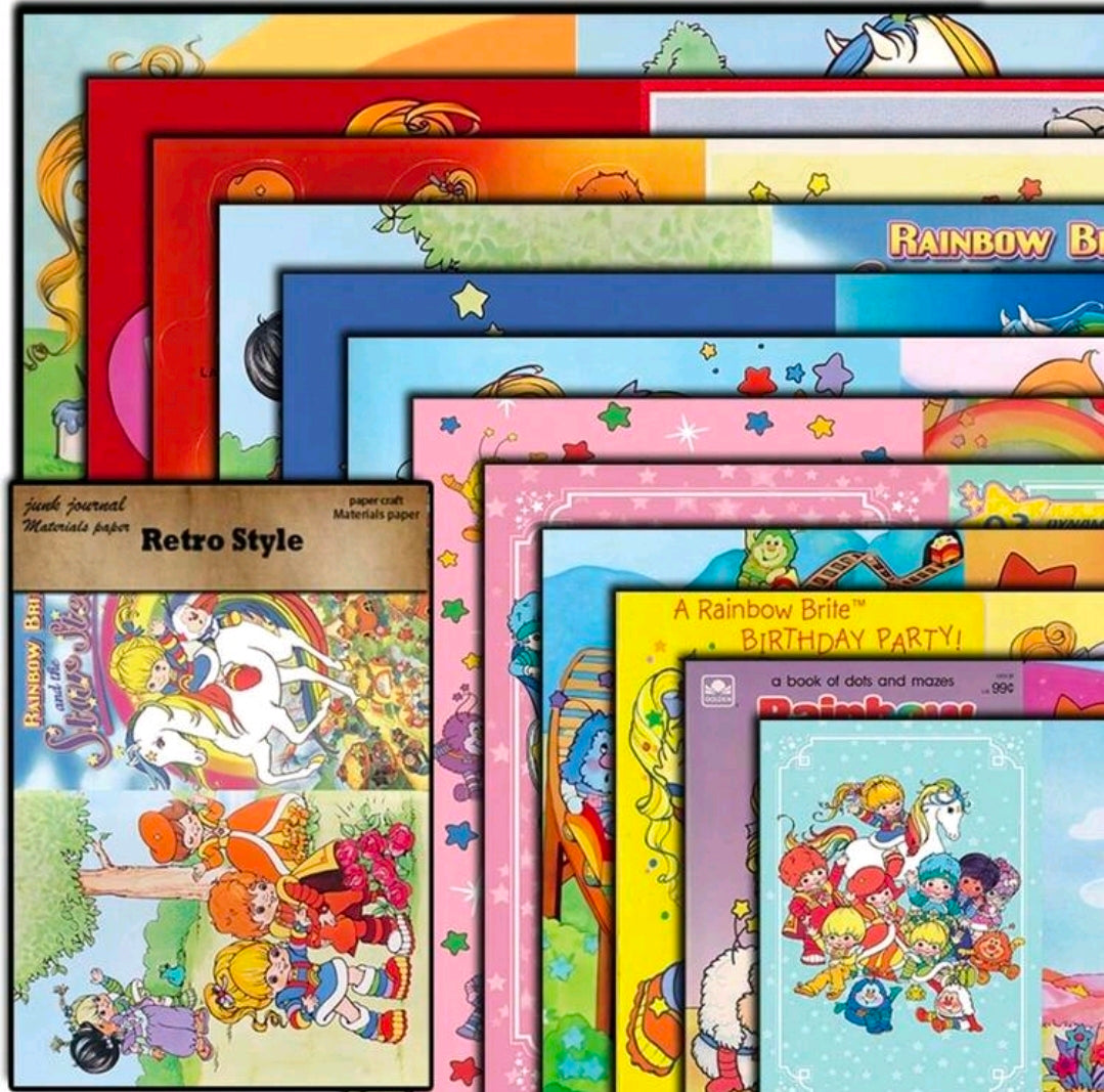 Stacked Rainbow Brite paper pads in retro style, overlapping covers with character collage